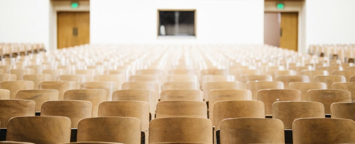 Photo by Nathan Dumlao empty chairs in theater