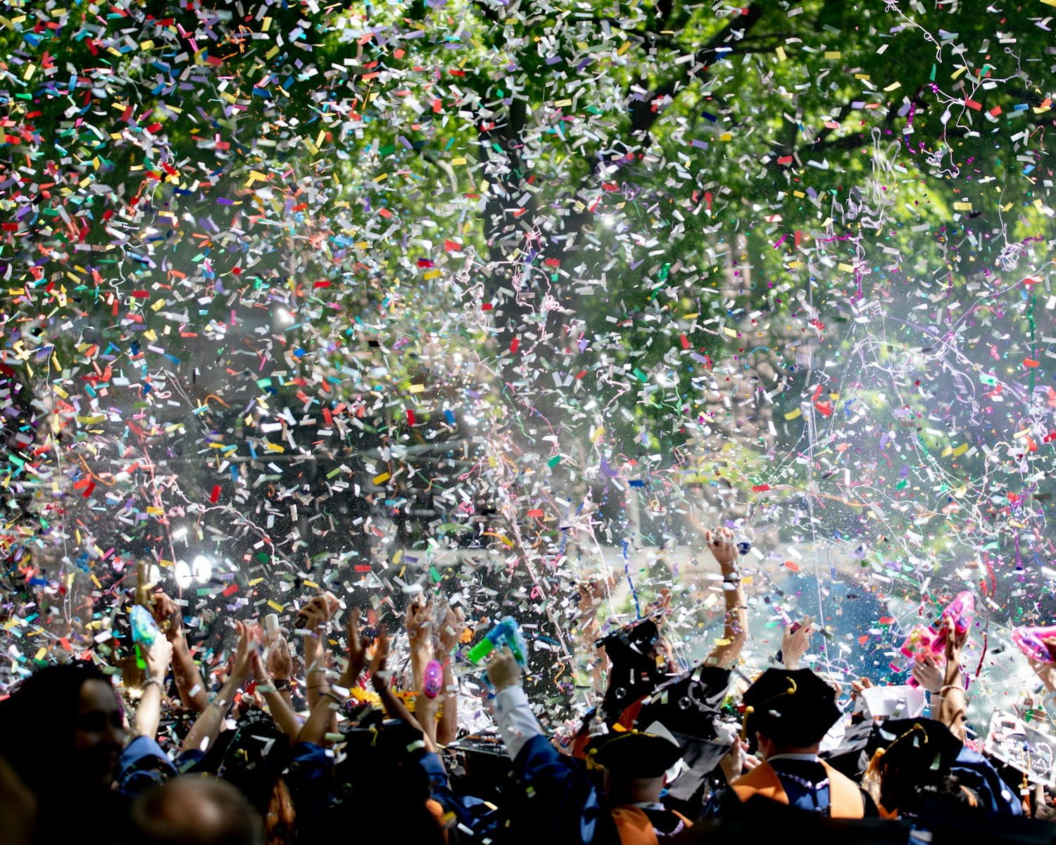 Photo by Keith Luke people covered by confetti